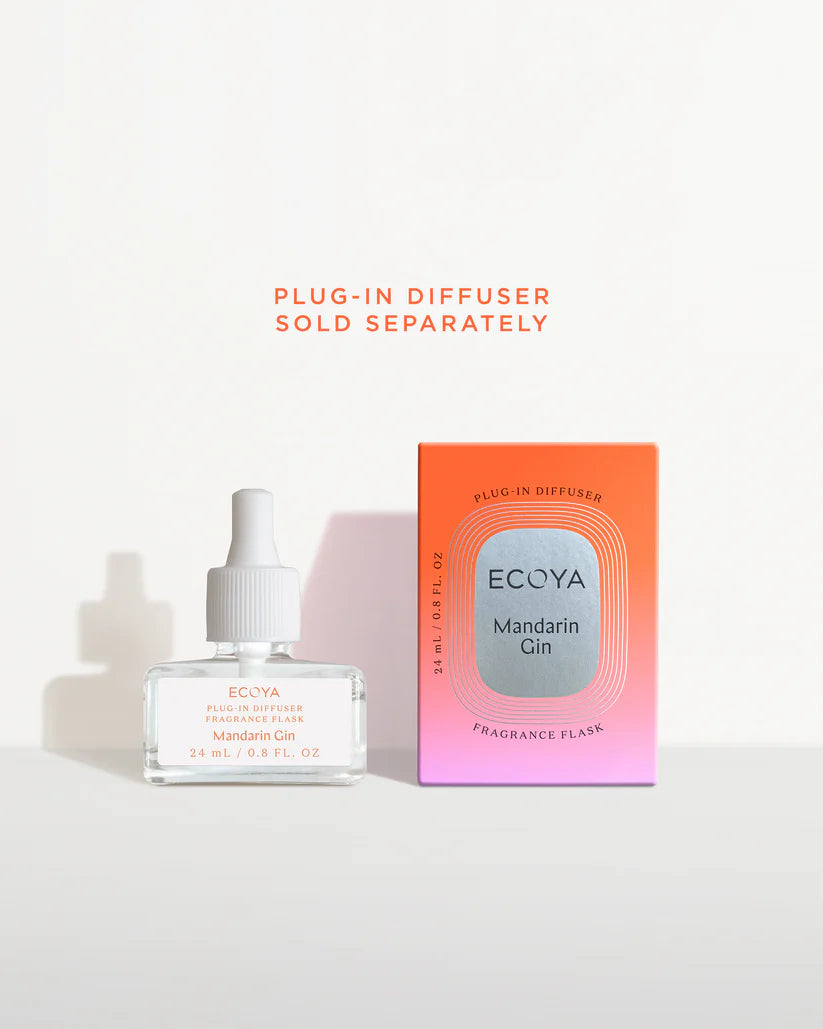 Ecoya Mandarin Gin fragrance flask with its coral gradient packaging