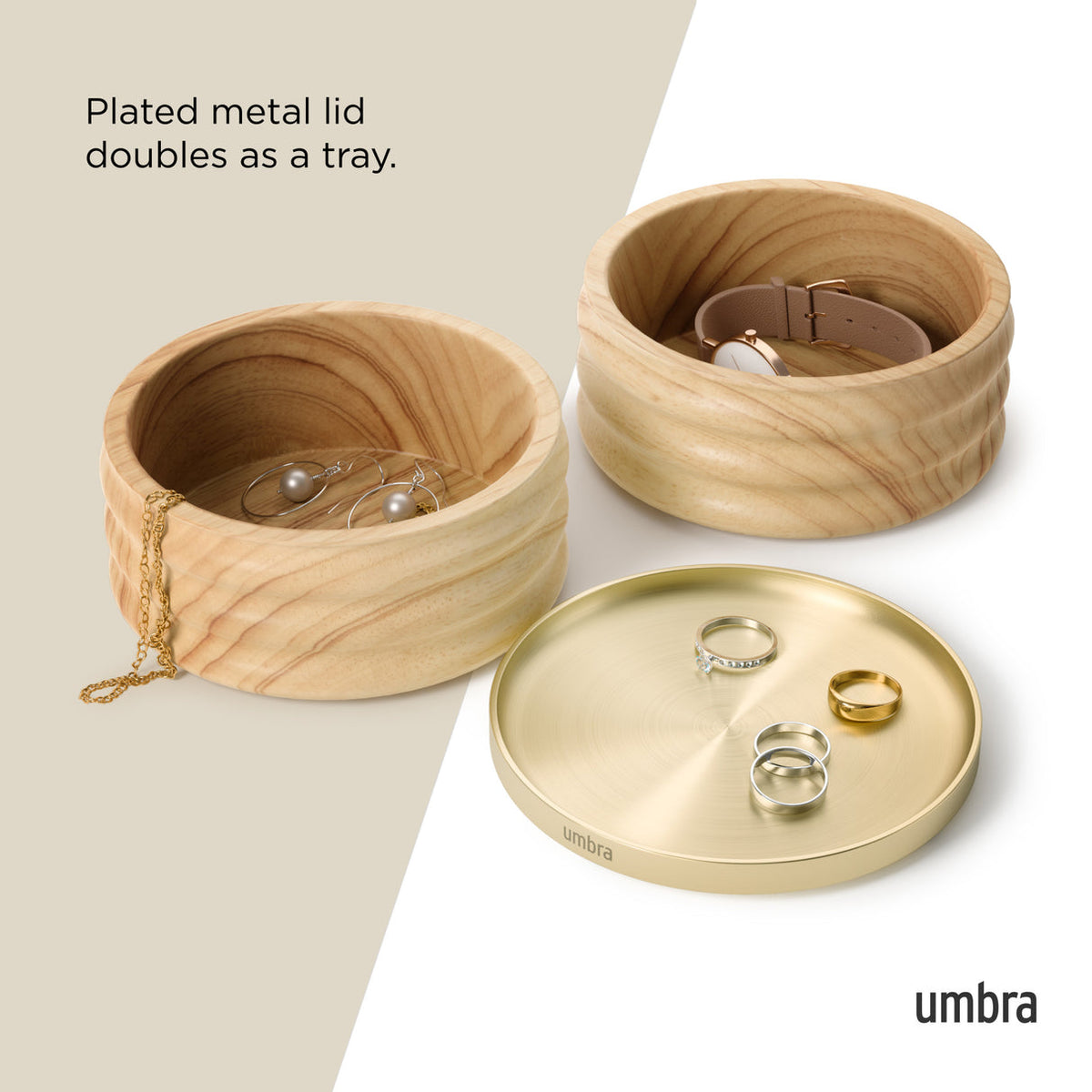 Umbra Tesora storage box open with its brass lid used as a ring tray