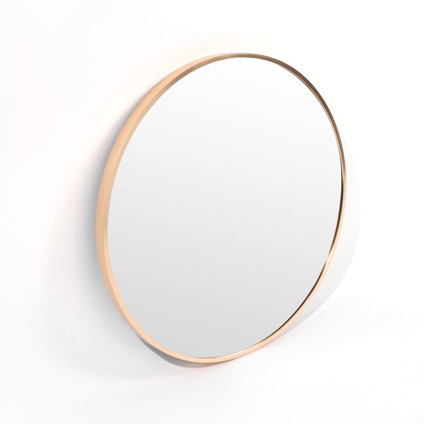 A sleek Bella Round Wall Mirror - 60 cm - Black / Brass / Chrome by Flux Home with a gold frame on a white surface.