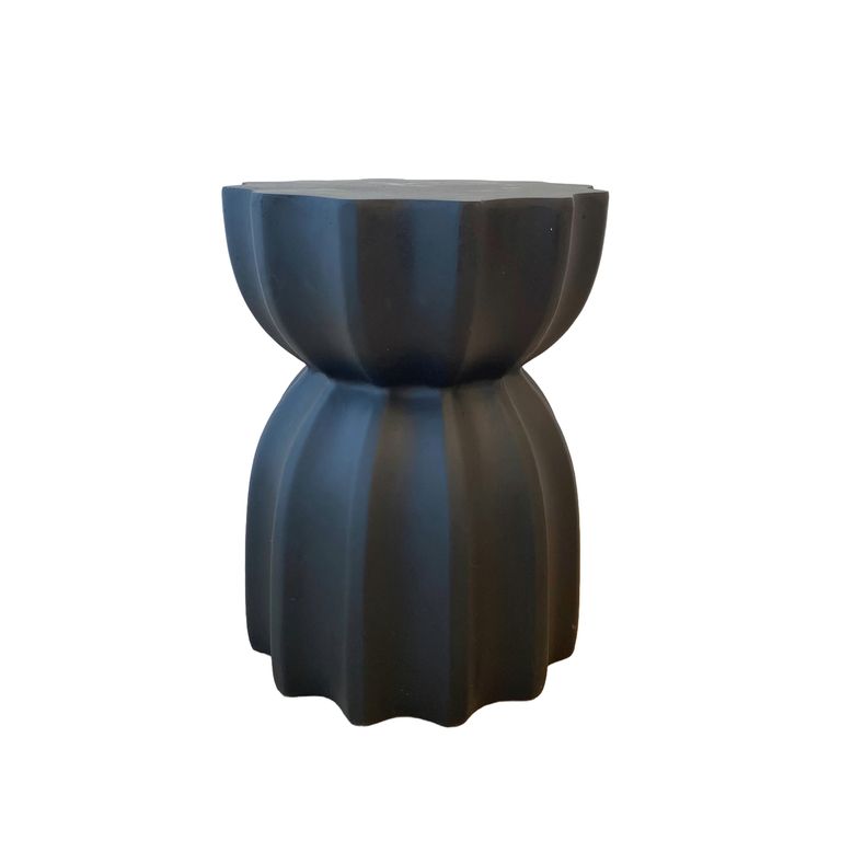 Fluted side table in black, a domed top above a scalloped column base