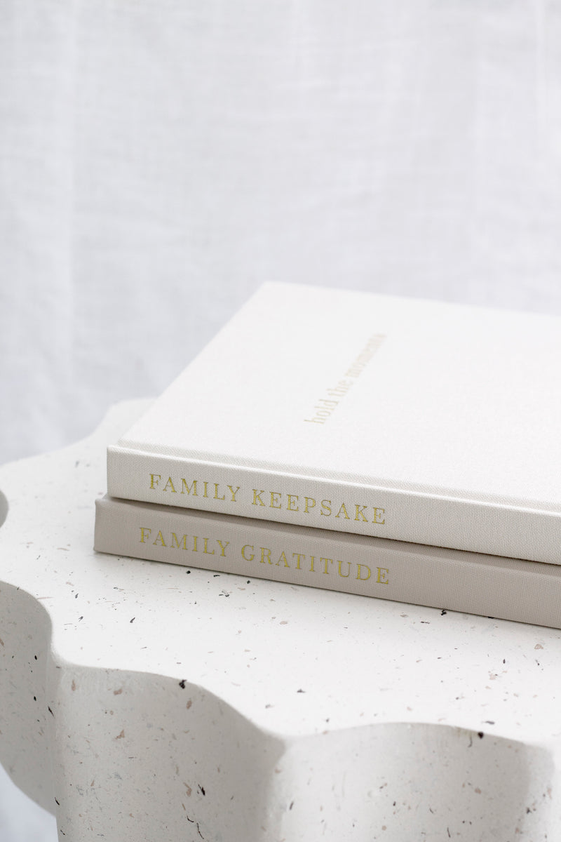 Family Keepsake Journal in neutral linen with gold embossing – heirloom book for recording family memories.