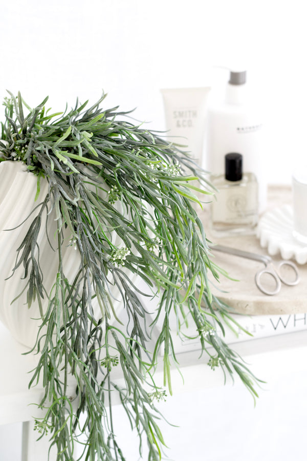 Full trailing greenery styled in modern interior
