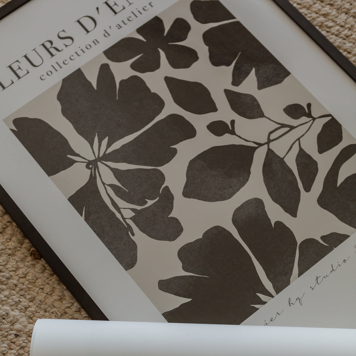Close-up of the Fleurs d'Encre ink botanical print in a natural timber frame