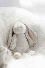 Flopsy Bunny soft toy in biscuit styled in a calm, Scandinavian-inspired nursery
