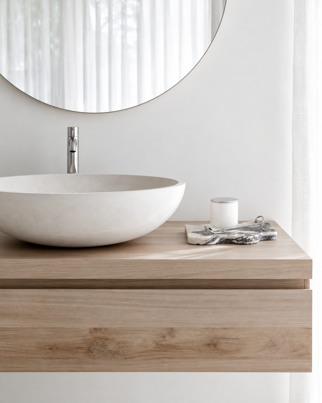 Frida Wavy Marble Tray on the bathroom vanity beside the basin