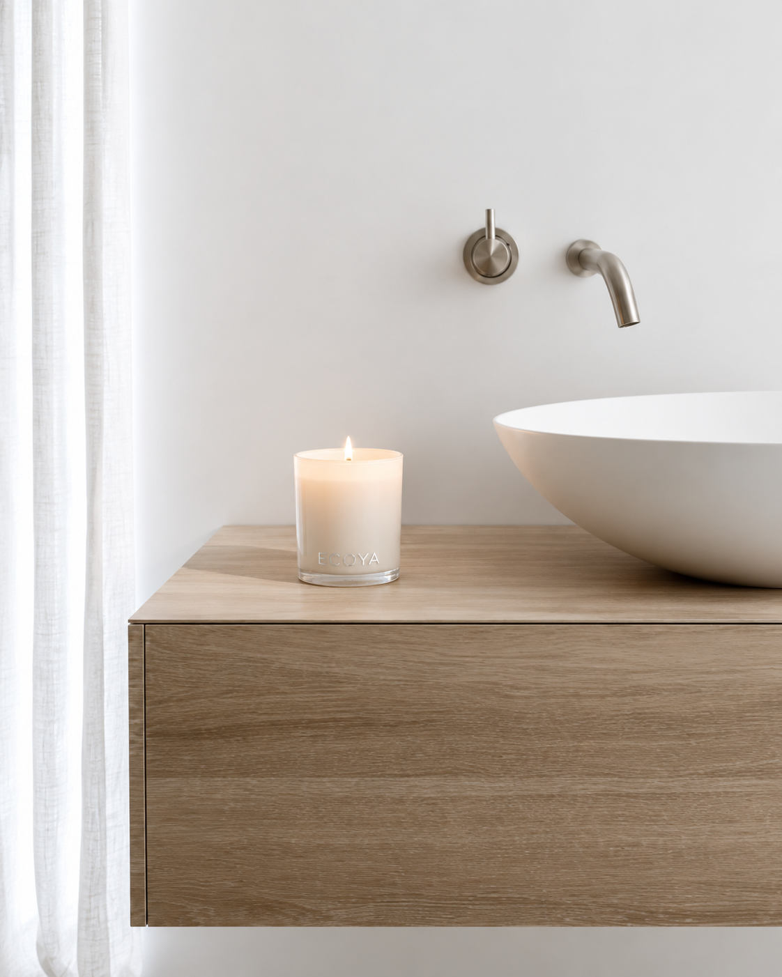 Madison Jar Soy Candle by Ecoya, Mini 80g or Large 400g in Lotus Flower styled on a vanity beside the basin