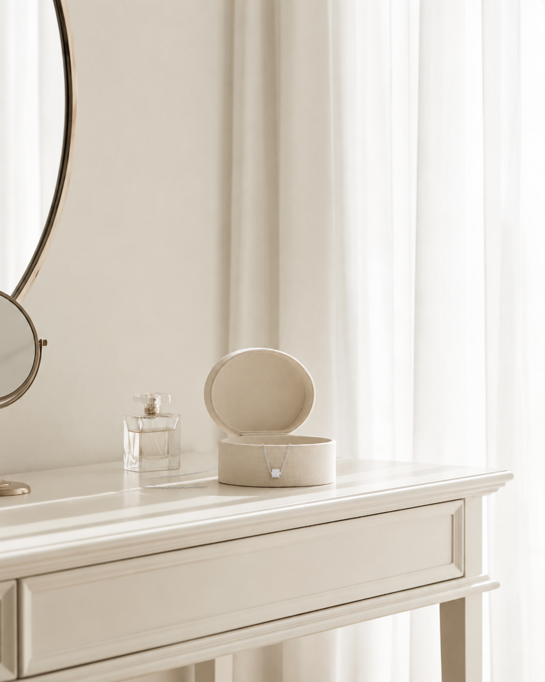 Federation Impressions Necklace in silver draped over an open linen jewellery box on a white dressing table