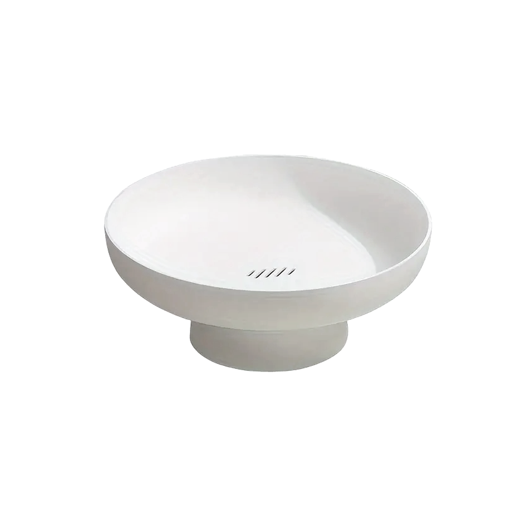 White pedestal bowl from above, showing the glossy interior and four small slots in the base