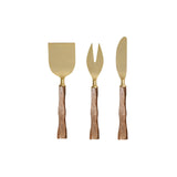 Gold cheese knives with wooden handles arranged as a three-piece set