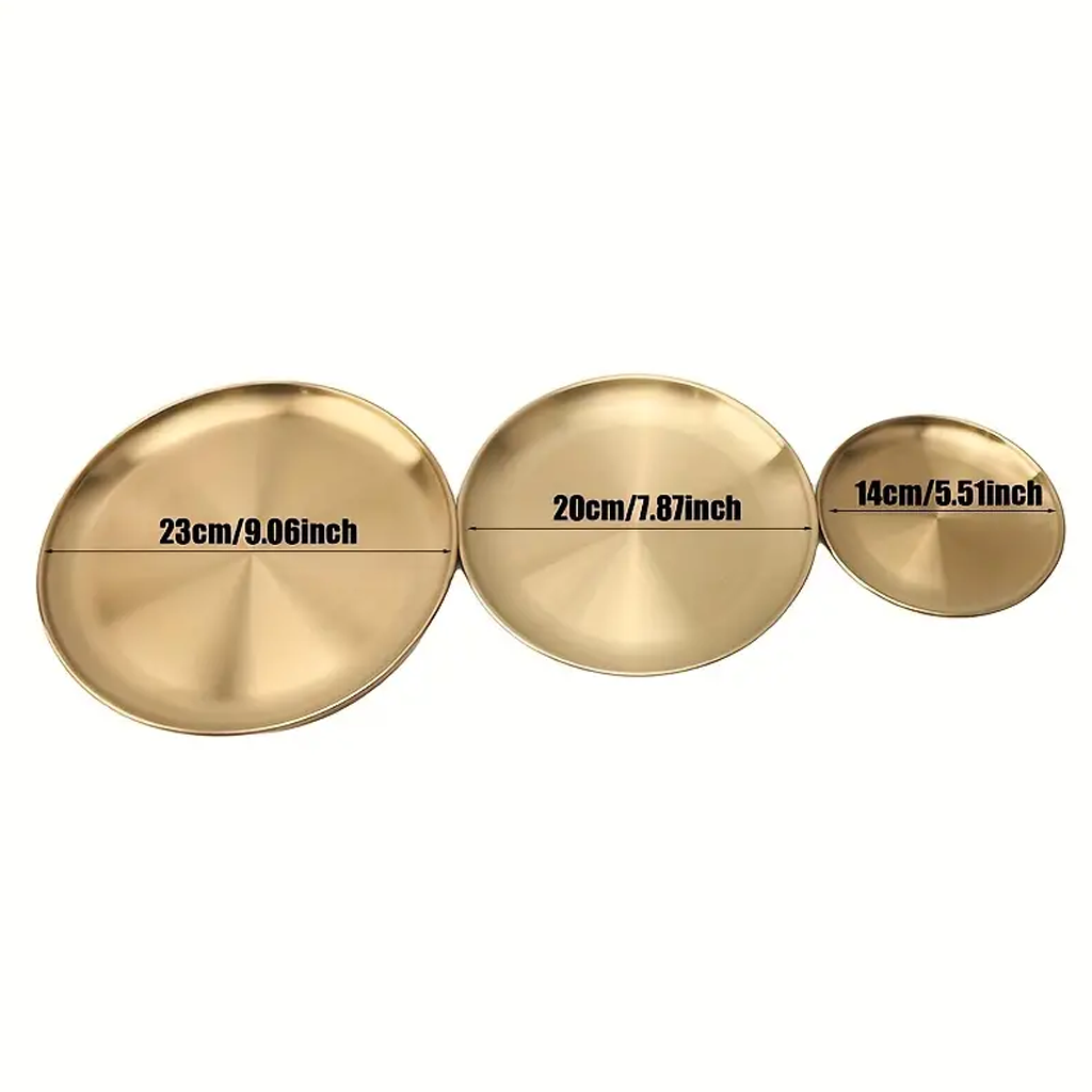 Round stainless steel decor tray shown from above