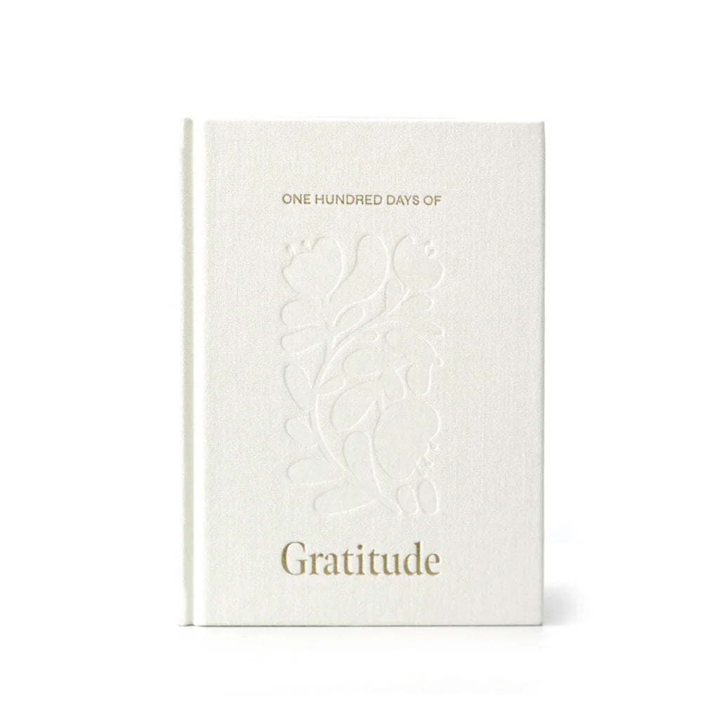 One Hundred Days of Gratitude journal by Olive + Page, front cover with gold title on white