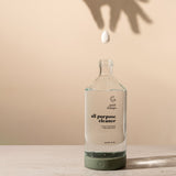Hand holding a Good Change cleaning tablet, natural plant based cleaning