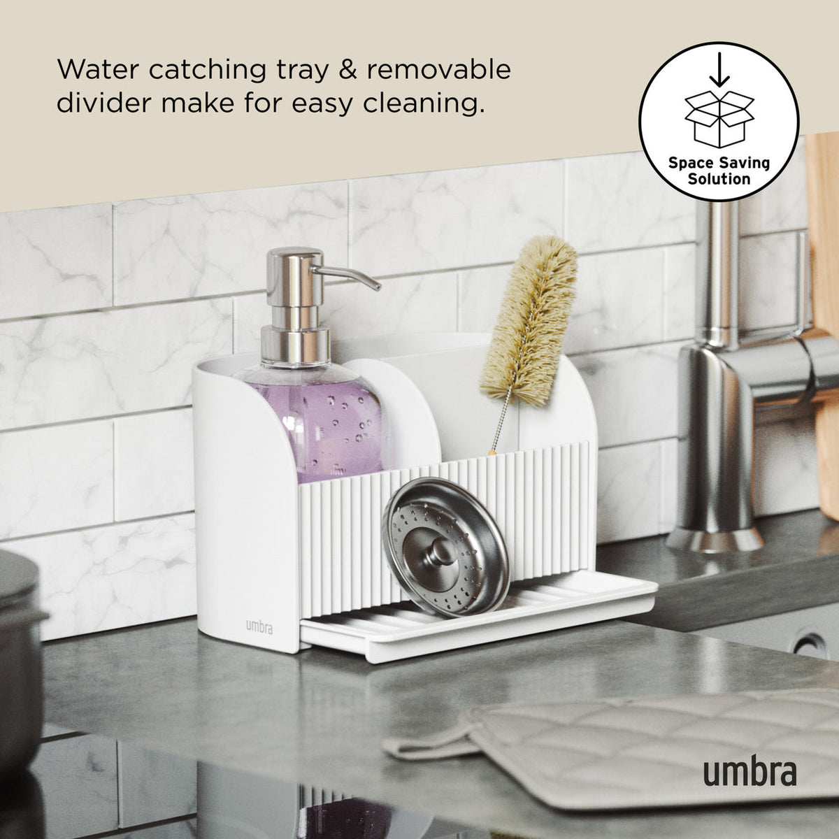 Umbra Sling sink caddy with a removable divider that lifts out for cleaning