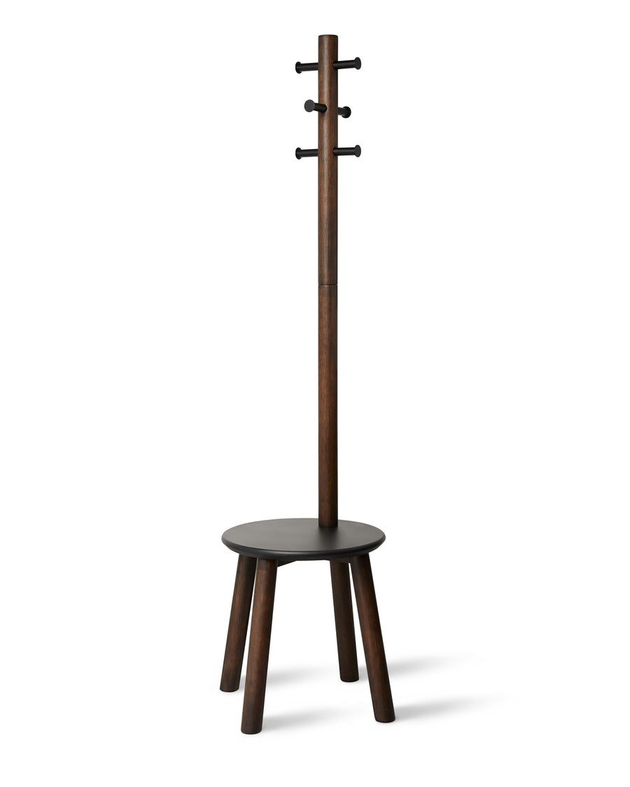Umbra Pillar stool and coat rack in black and walnut, six hooks above a round seat