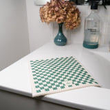 Good Change eco cloth styled beside natural cleaning products at home
