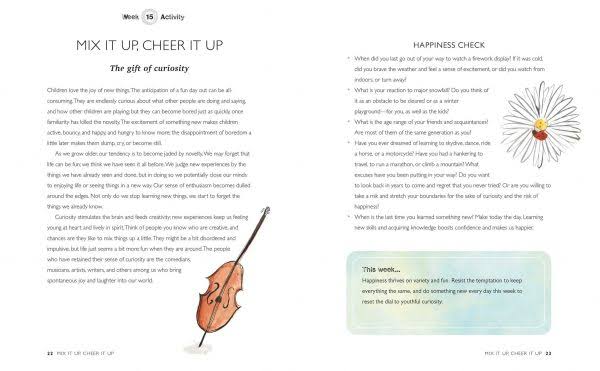 A Year of Living Happily spread headed Mix It Up Cheer It Up, on curiosity, with a cello illustration