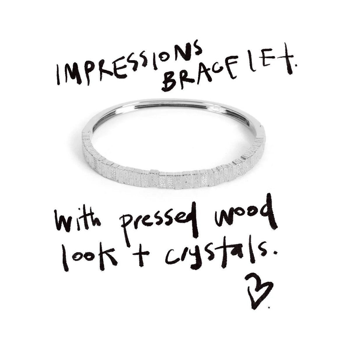 Silver Impressions Bracelet with handwritten notes about the pressed wood look and crystals