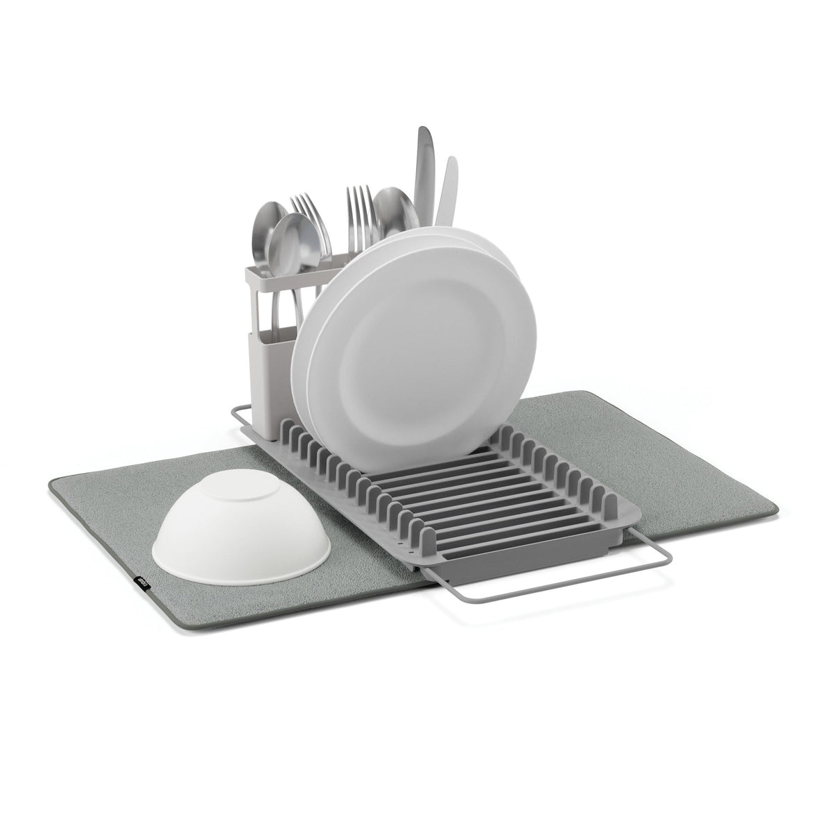 Umbra Udry dish rack in charcoal holding plates and cutlery beside its grey drying mat