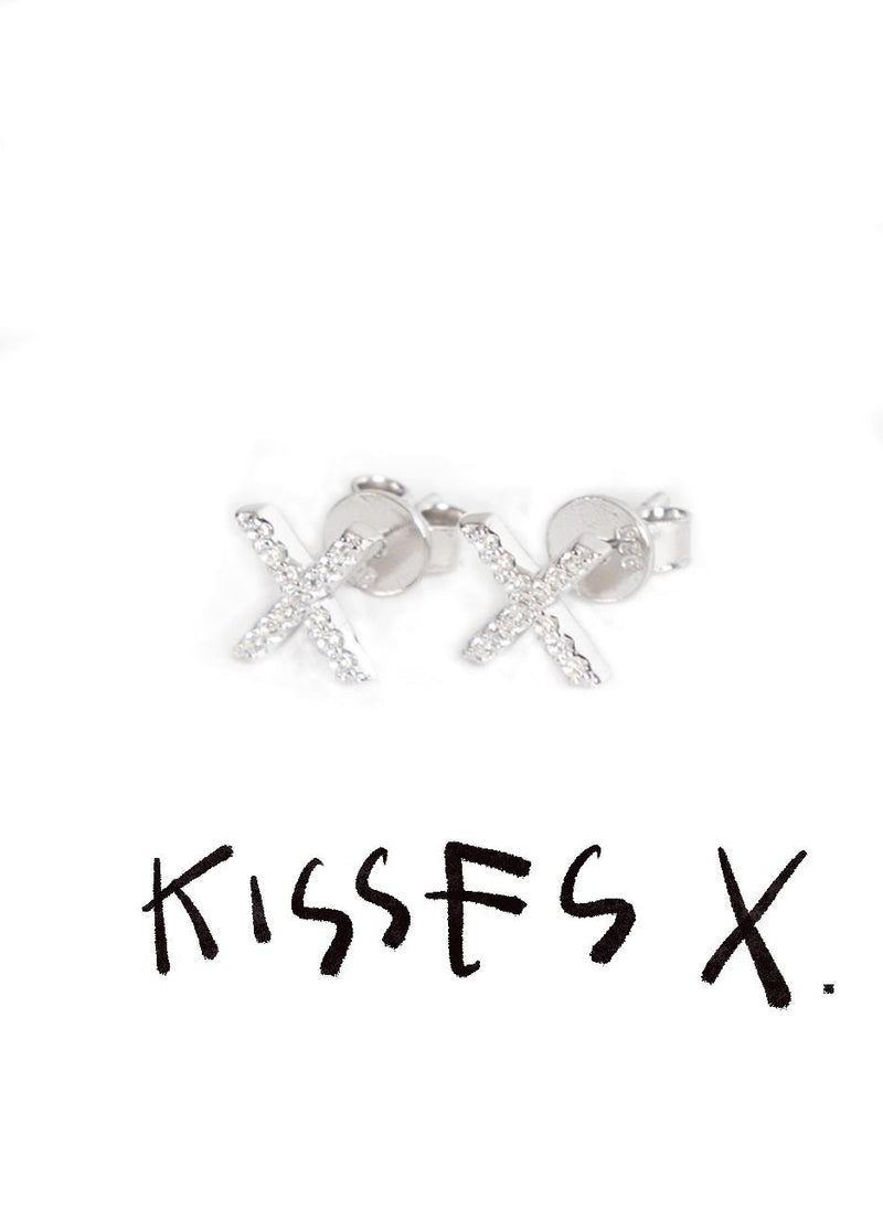 Kisses Studs on white above the handwritten words Kisses X