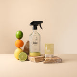 Kitchen reusable glass spray bottle with silicone base on a benchtop