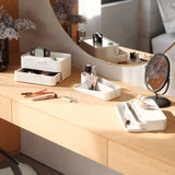 An Umbra Glam Cosmetic Organizer Large with a mirror on it.