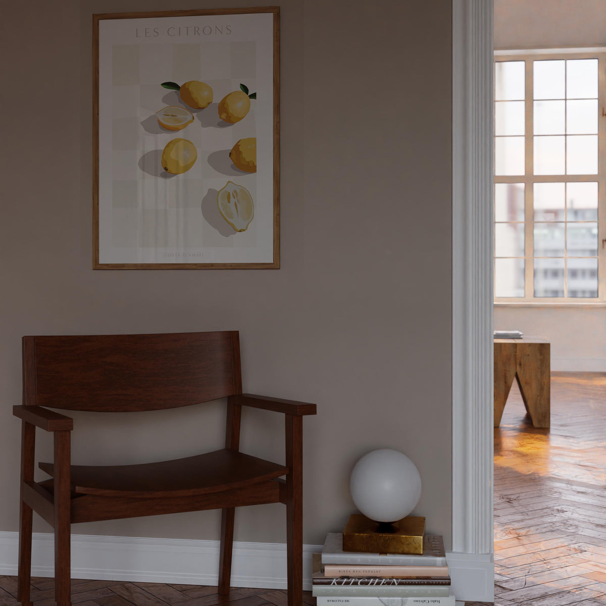 Les Citron print in a natural frame above a dark timber chair in a taupe room with a globe lamp
