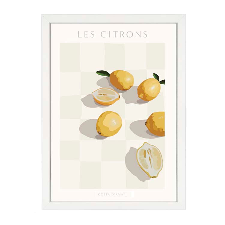 Les Citron Print by Papier HQ in a white frame, painted whole and halved lemons on a pale cream checkerboard