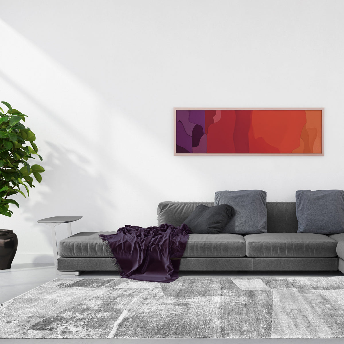 Grey abstract rug in front of a grey sofa with a plum throw and a long colourful artwork