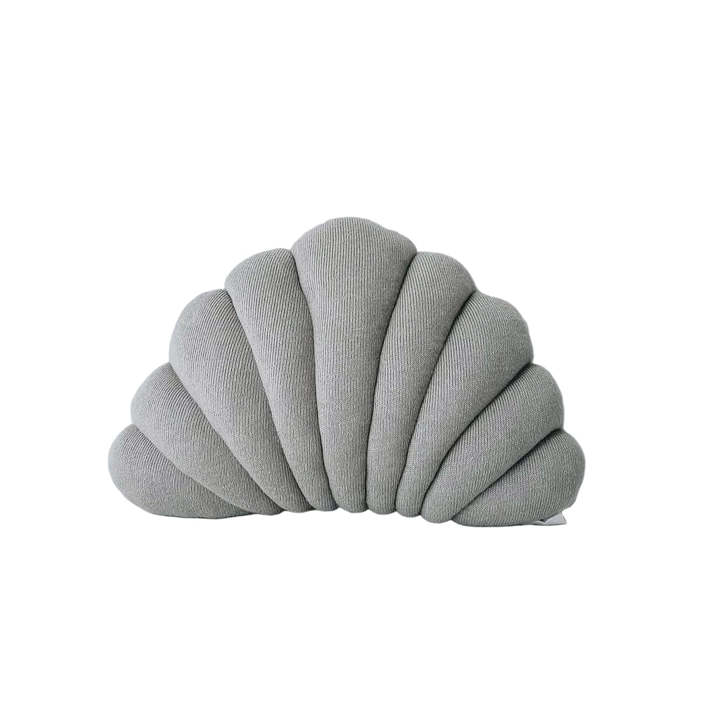 Small Shell Cushion in Mist grey, a sculptural scalloped shell shape, on a white backdrop