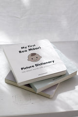 My First Reo Māori Picture Dictionary board book stacked on neutral table