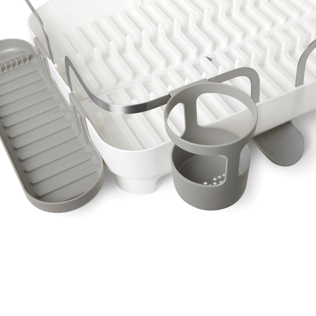 Close up of the removable cutlery caddy and drainage tray on the Holster dish rack