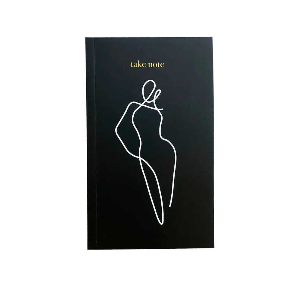 Black linen Homebodii notebook with gold foil line art detail