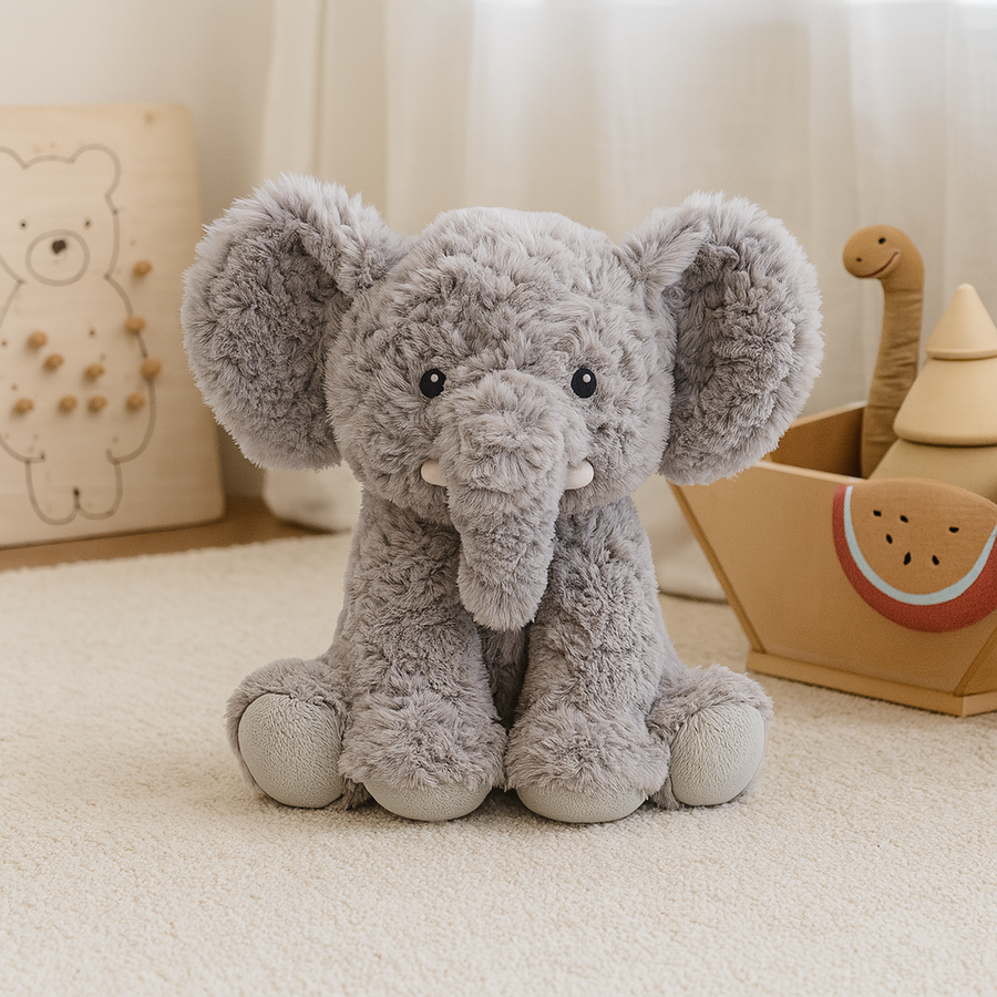 Peanut the Elephant soft toy by Lily & George styled in a softly styled nursery