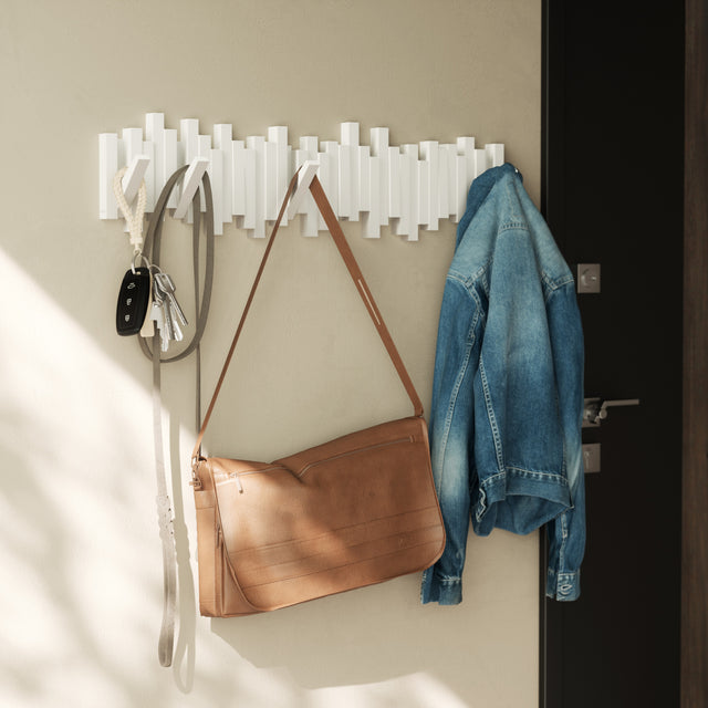 Umbra Sticks Multi Hook 8 hooks mounted in a hallway