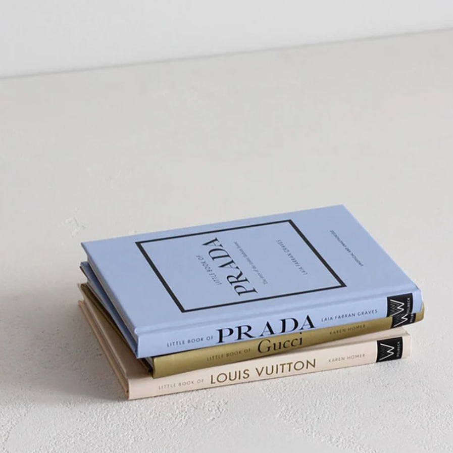 Little Book of Prada styled on a shelf with neutral home decor