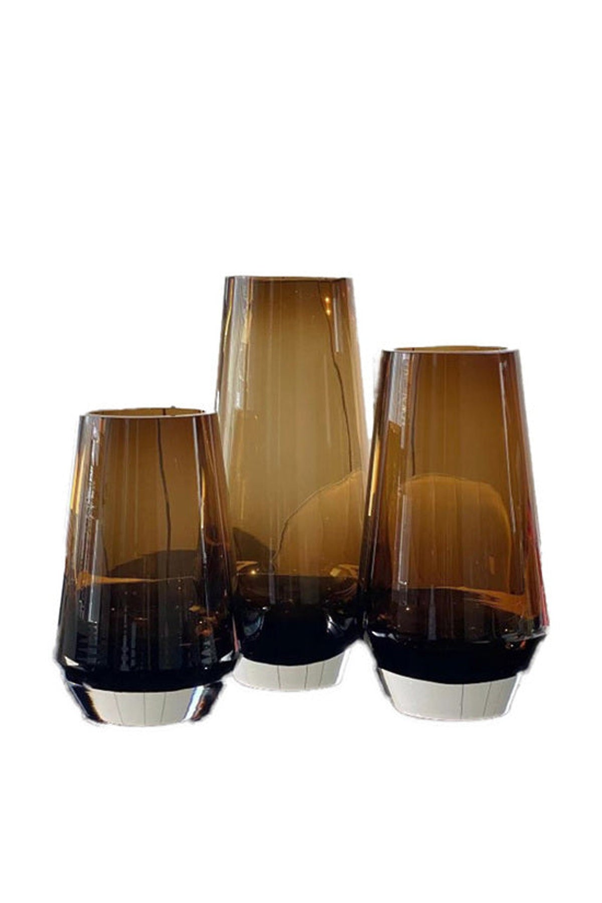 Pyriform Vases in tobacco glass, three tapered pear-shaped vases in graduated heights with heavy clear bases