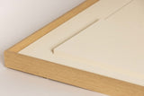 A Ned Collections Laan Print frame with a piece of paper in it.