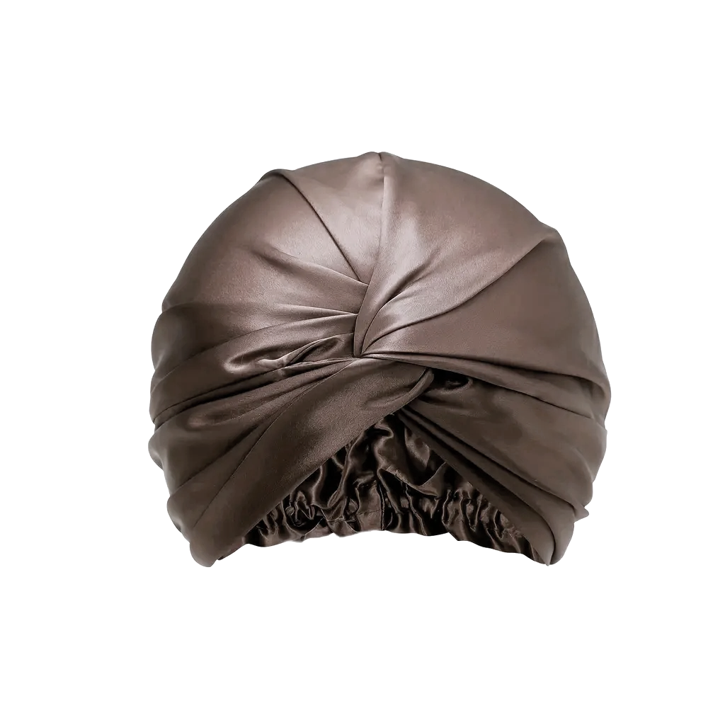 Mulberry silk sleep bonnet in dark brown with a twisted front knot, on a plain background