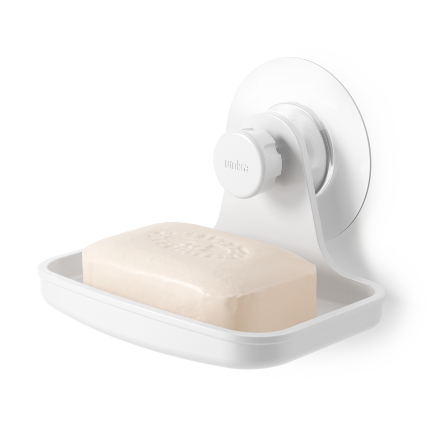 Umbra Flex adhesive soap dish in white holding a bar of soap