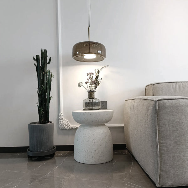 A living room with a Pedestal Side Table - Fleck White from Flux Home and a modern design.