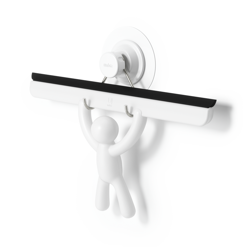 A person demonstrating the practicality of the Umbra Buddy Squeegee White towel hooks.