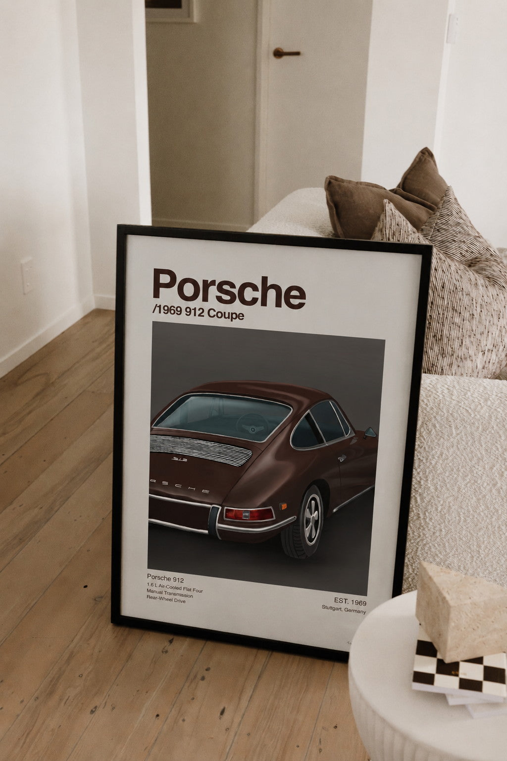 The 912 Coupe car print by Papier HQ styled in a home setting