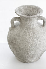 Thira Vase with curved handles and textured stone surface, side view