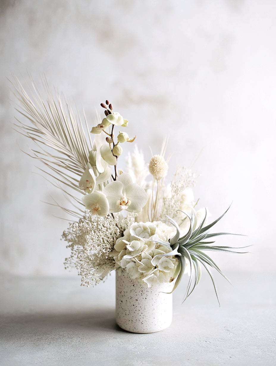 Faux pineapple air plant styled in a decorative bowl