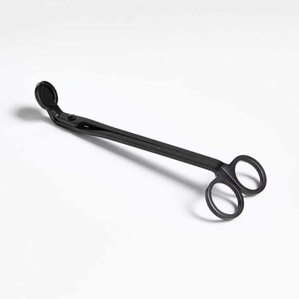 Black candle wick trimmer shown alone at an angle against a soft grey background