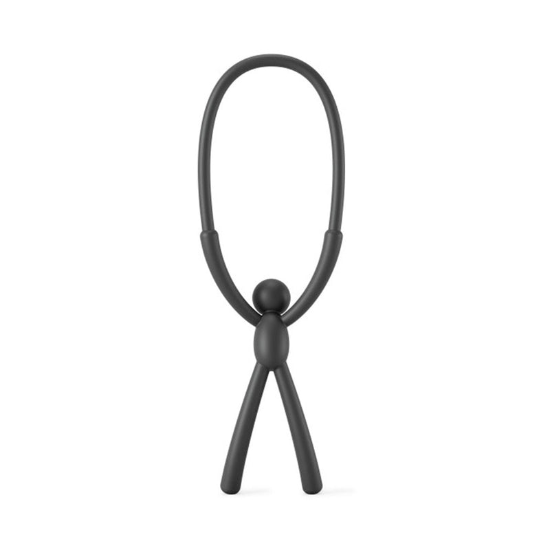 Modified Sentence: A flexible black plastic figure, known as Umbra Buddy Flex Sink Caddy - Black, standing on a white background.