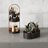 Walnut wood handle on the black Umbra Bellwood storage caddy
