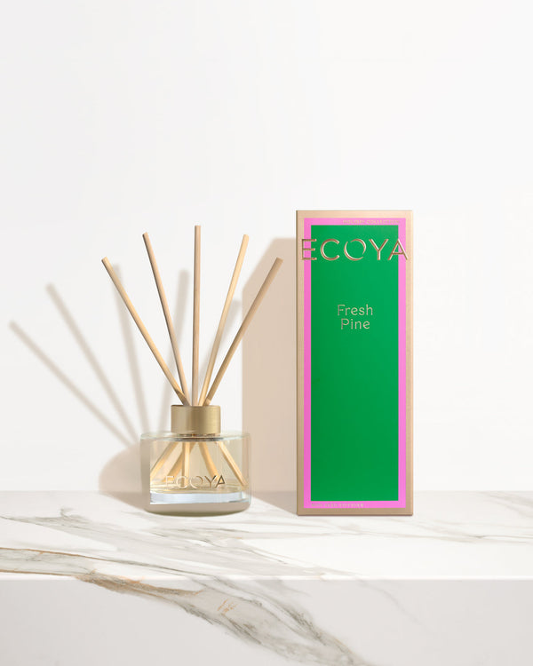 Ecoya Holiday: Fresh Pine Mini Diffuser on a marble table.