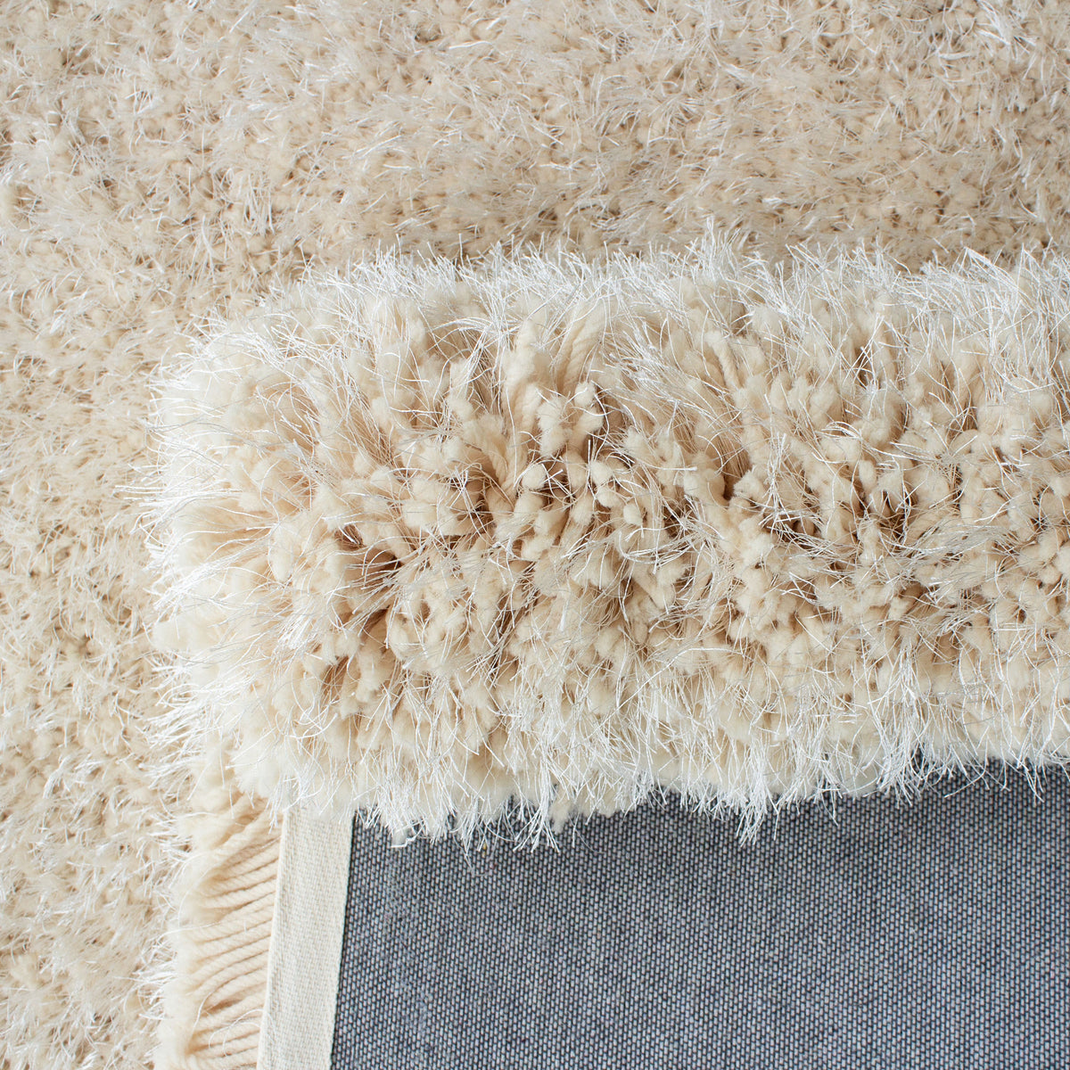 Close view of the soft beige shag strands