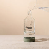 Filling a Bottle For Good with warm water to dissolve a Good Change refill tablet